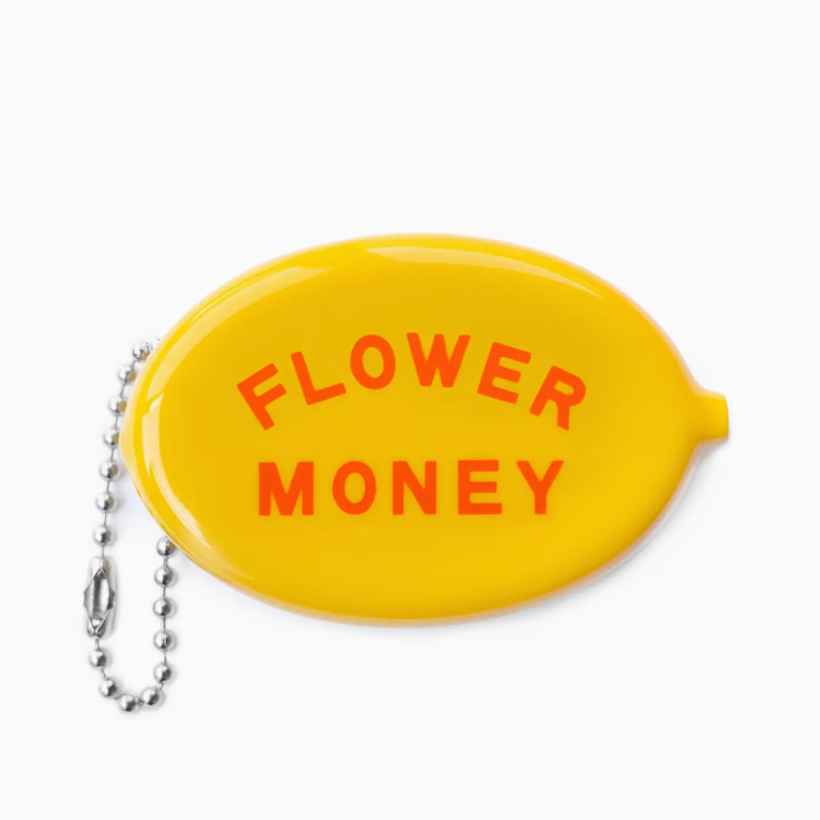 Yellow charm with 'FLOWER MONEY' text on a white background